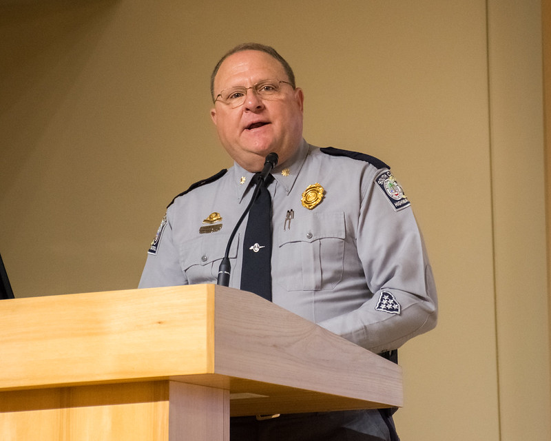 Major Gamble speaking at podium