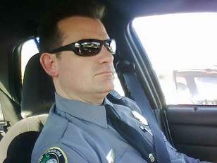 Kirkpatrick in patrol car