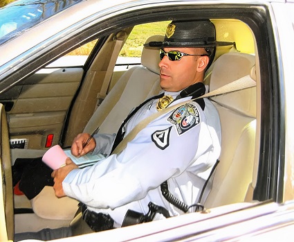 Knox in the patrol car
