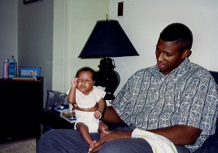 Patterson with his newborn son