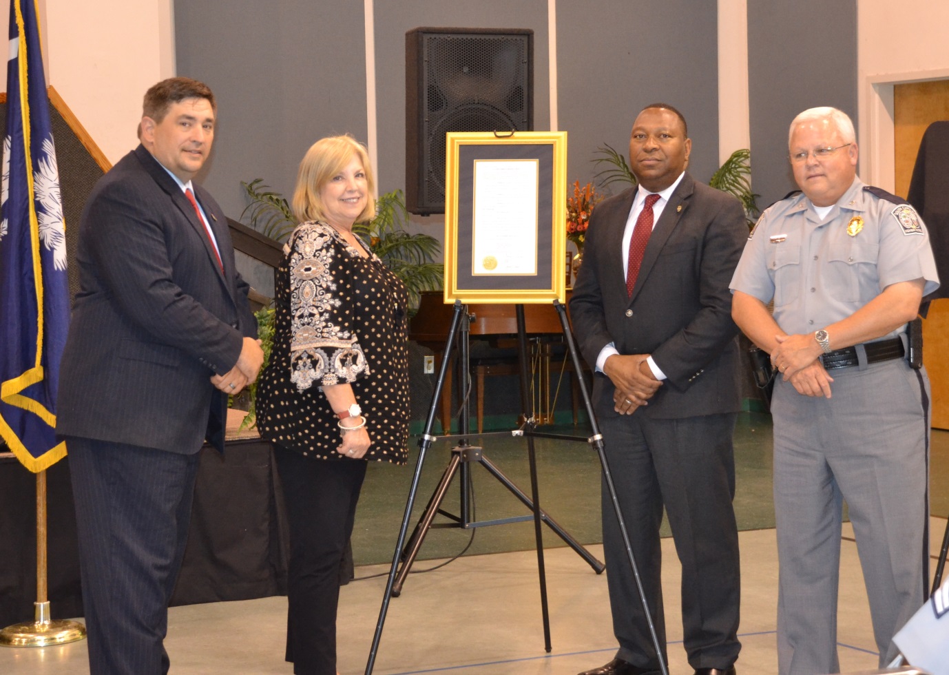 Family of Patrolman Harlan Smith with Director Smith and Col. Oliver